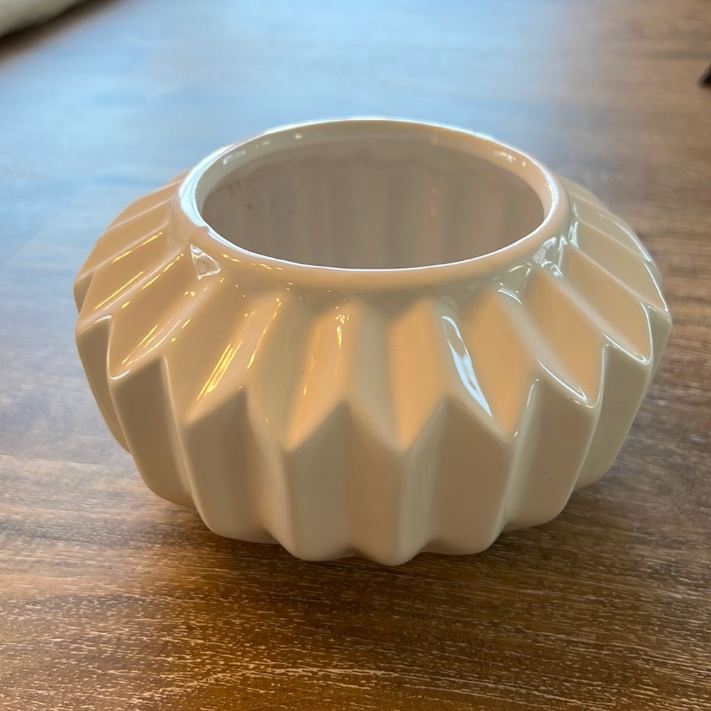 Small decorative vase/planter/candle holder.